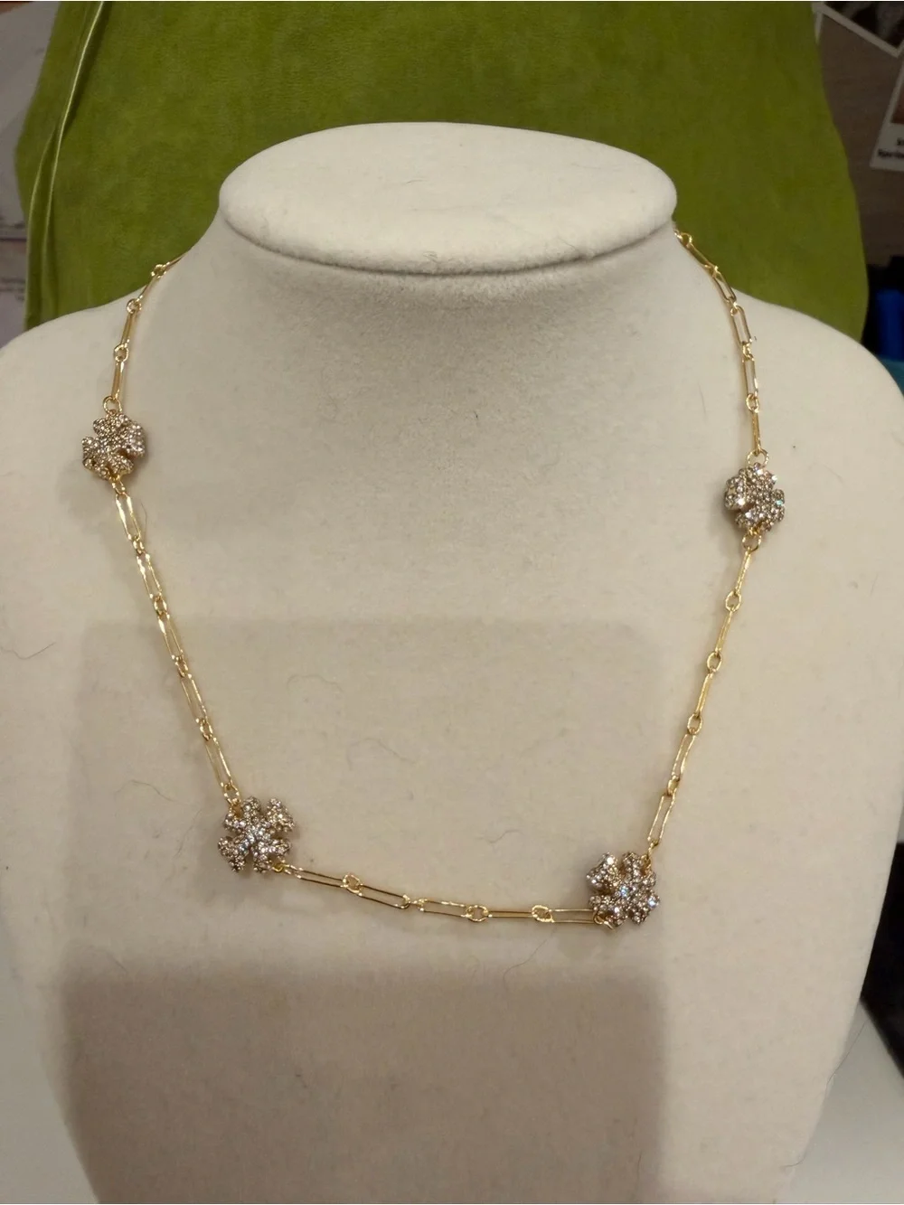 Tory Burch pave logo shape link necklace.